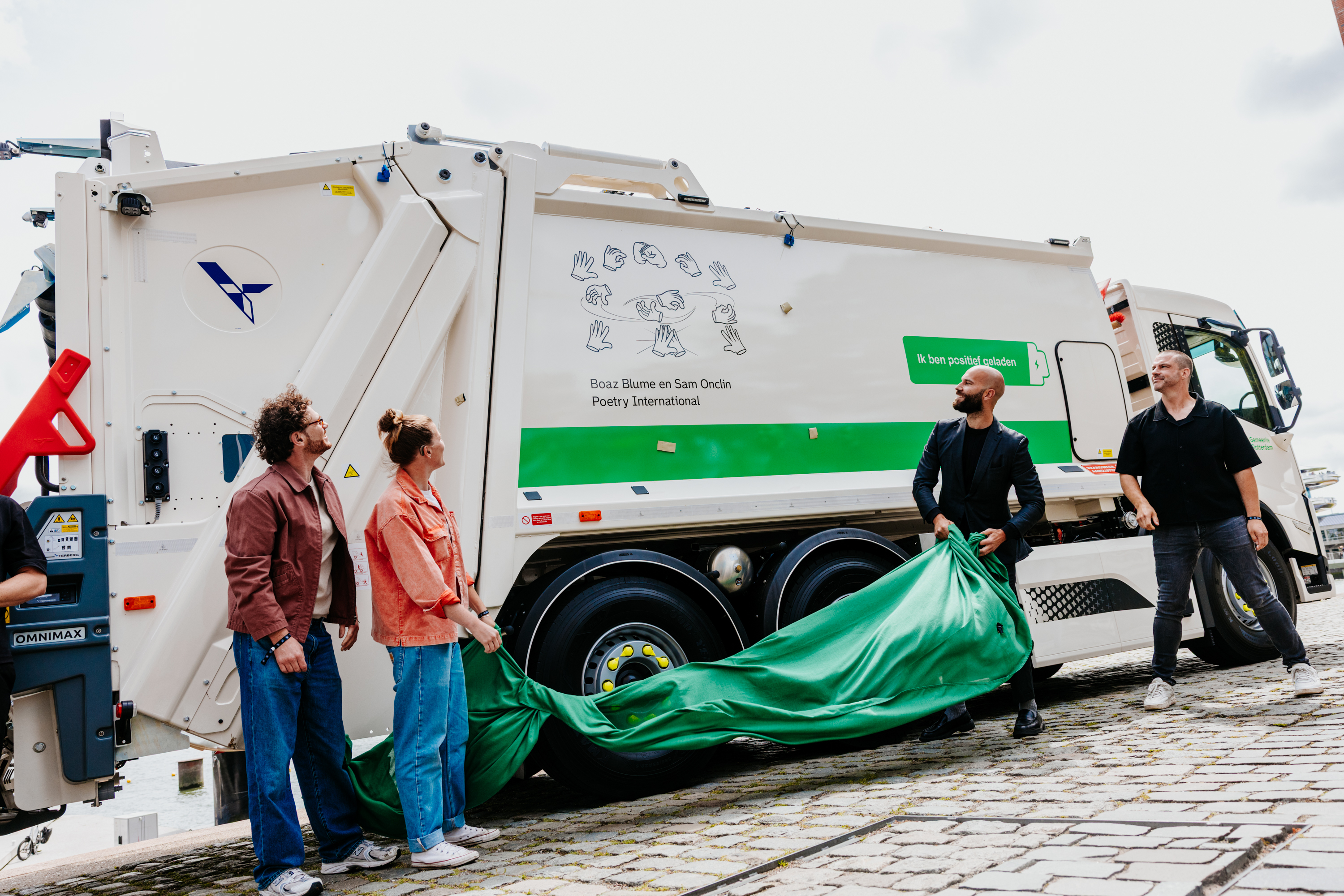 First-ever line of poetry in sign language on a garbage truck